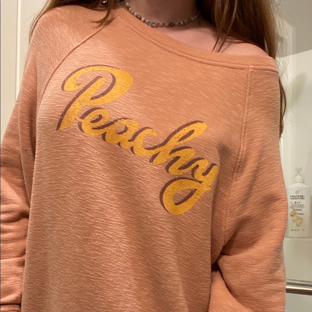 peach sweater